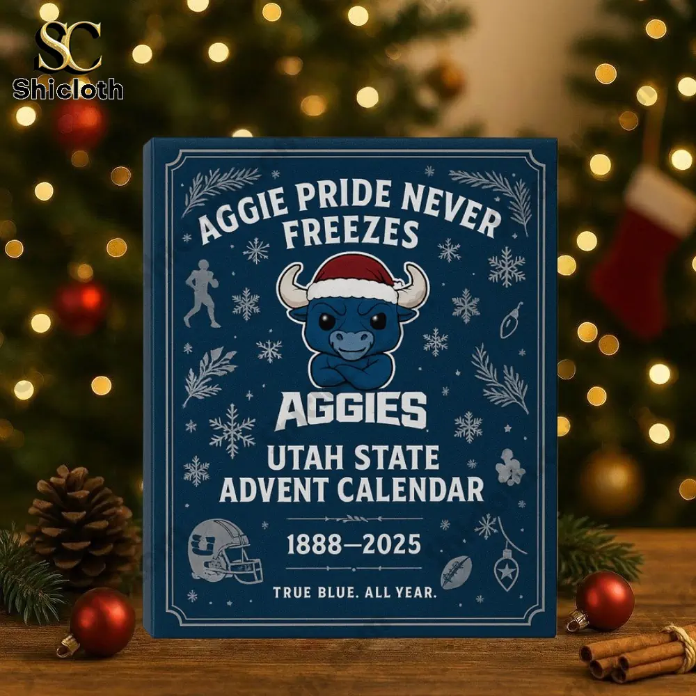 Close up of the Utah State Aggies Advent Calendar 2025 box with Christmas lights in the background.
