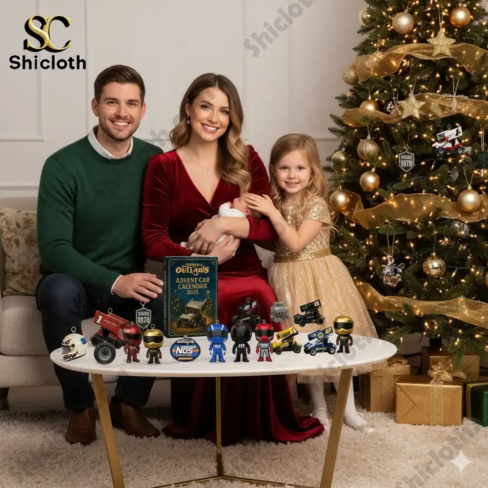 A smiling family sitting beside a Christmas tree with the World of Outlaws Advent Car Calendar 2025 displayed on the table surrounded by miniature sprint car figures.