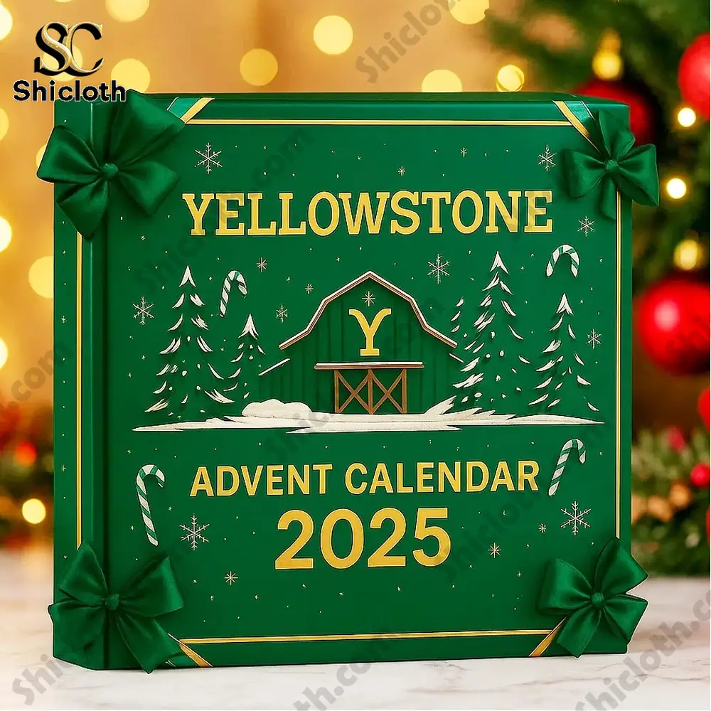 A close up of the green Yellowstone 2025 advent calendar box with gold lettering and festive ribbon decorations!