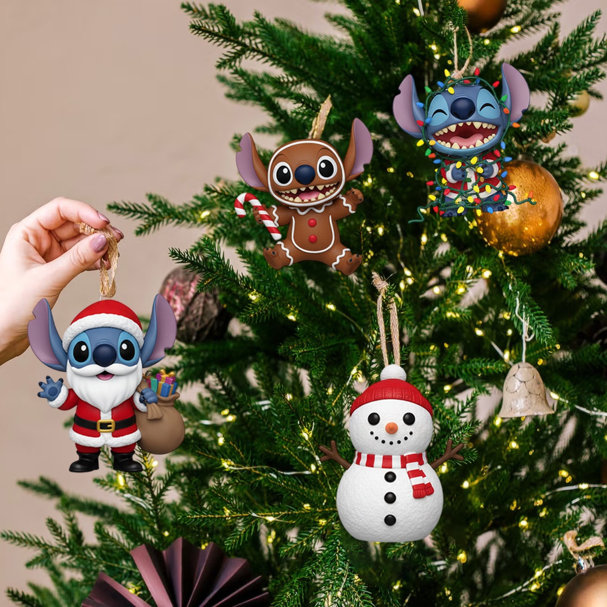 Ohana Christmas Magic Advent Calendar 2025 4 Christmas tree decorated with Stitch ornaments including Santa, gingerbread, snowman, and light-wrapped designs.