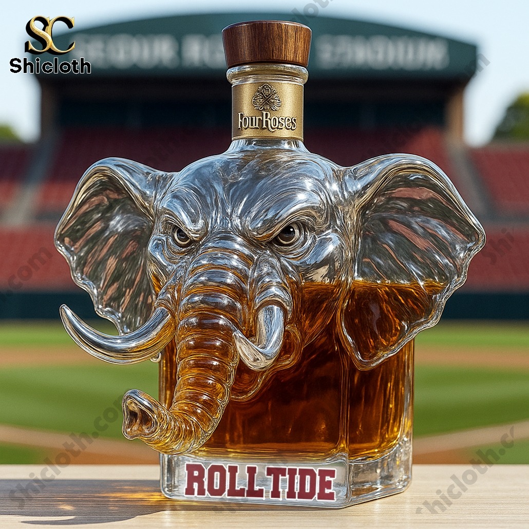 University of Alabama Crimson Tide Whiskey Bottle 7 Elephant-shaped whiskey bottle with Four Roses cap labeled Roll Tide on a stadium table!