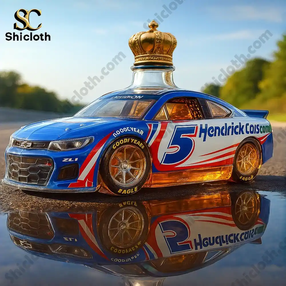 Hendrick Motorsports number 5 race car whiskey bottle with a golden crown cap on a reflective surface.