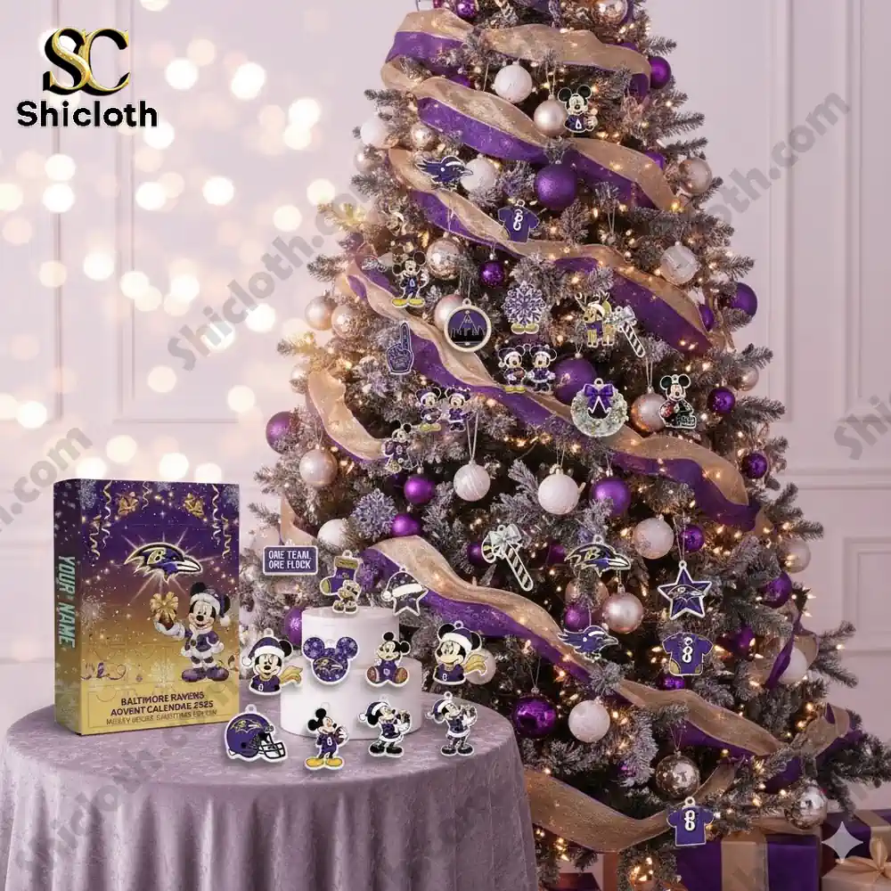A Christmas tree decorated with Baltimore Ravens and Mickey Mouse themed ornaments next to the Advent calendar box!