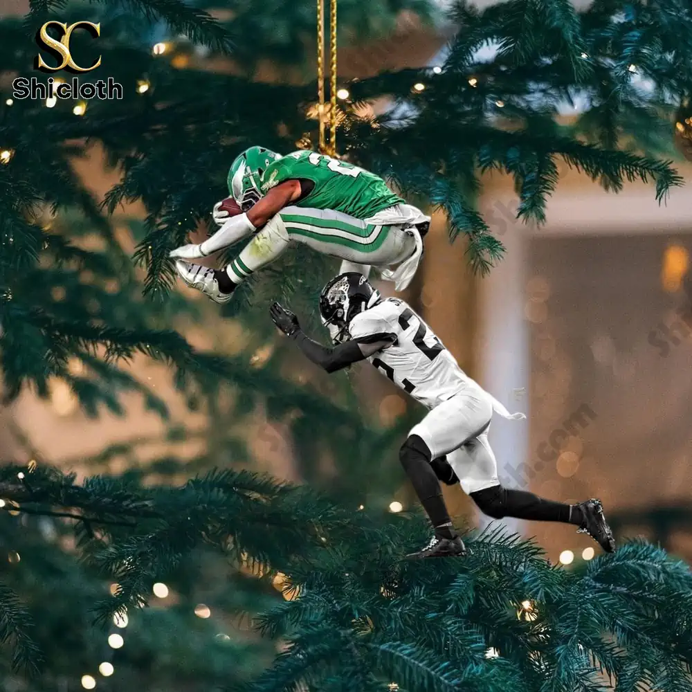Close up of athlete themed ornament on a Christmas tree.