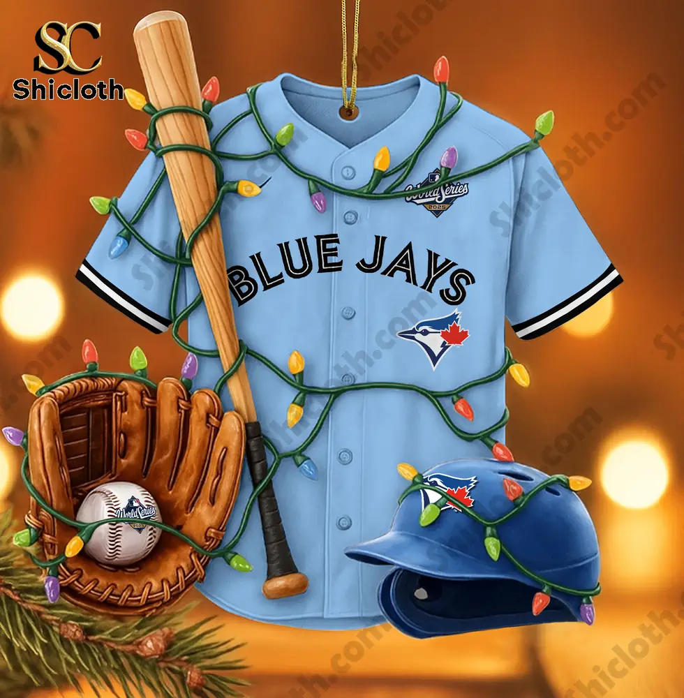 Close up of a Blue Jays jersey Christmas ornament decorated with colorful string lights, bat, glove, and helmet!