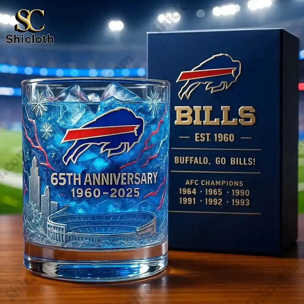 A Bills sixty fifth anniversary glass filled with blue ice beside a matching gift box.