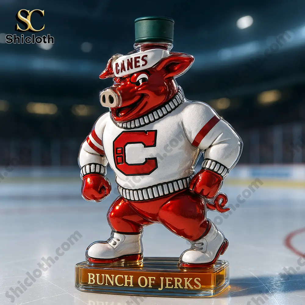 A red and white hog mascot bottle in a sweater stands on an ice rink background!
