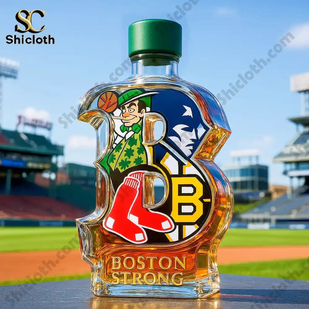 Close up of a Boston Strong shaped decanter with green cap on a sports field backdrop!
