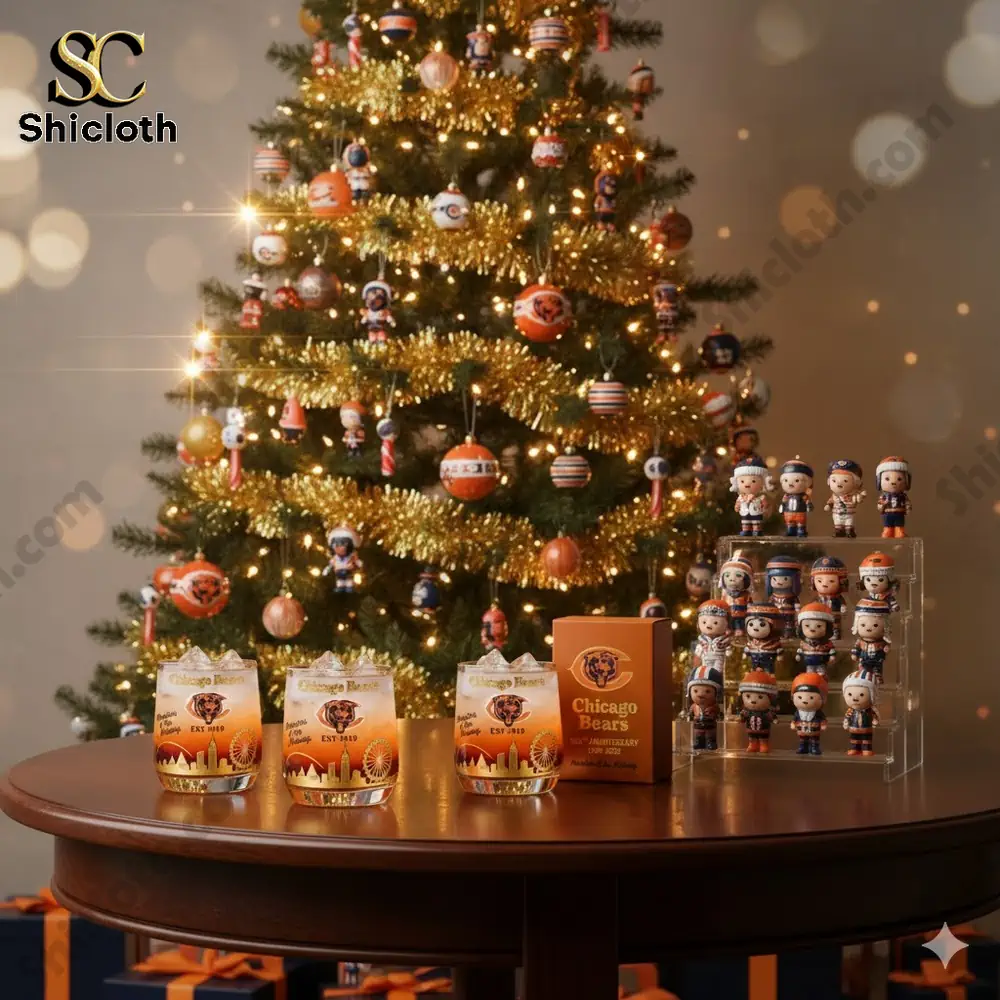 A decorated Christmas tree with Chicago Bears themed ornaments and collectible figurines displayed on a table.