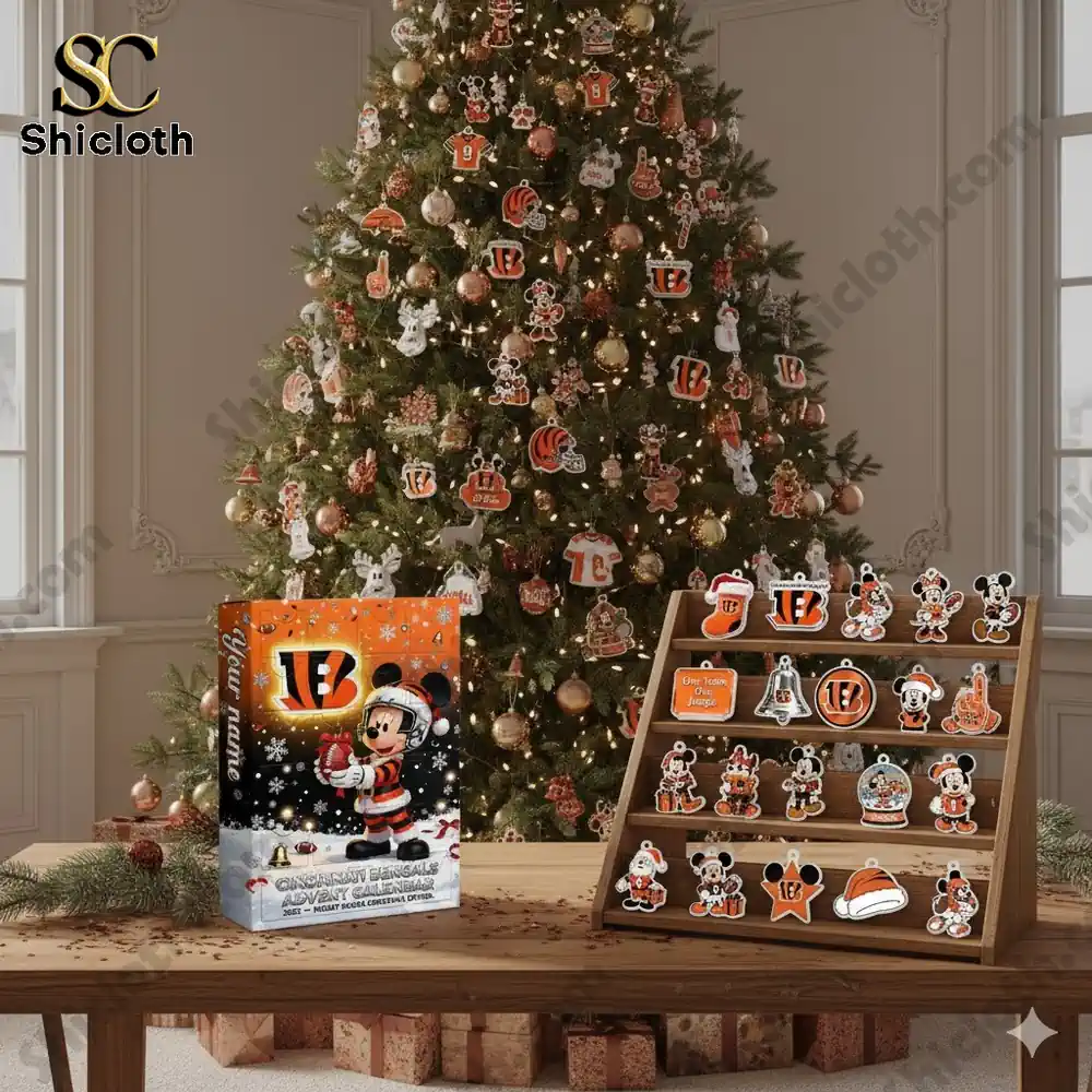 Christmas tree decorated with Cincinnati Bengals x Mickey Mouse ornaments and Advent calendar box on a table!