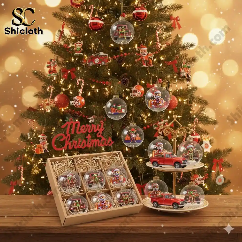 A decorated christmas tree with clear ornaments showing cartoon characters and trucks.