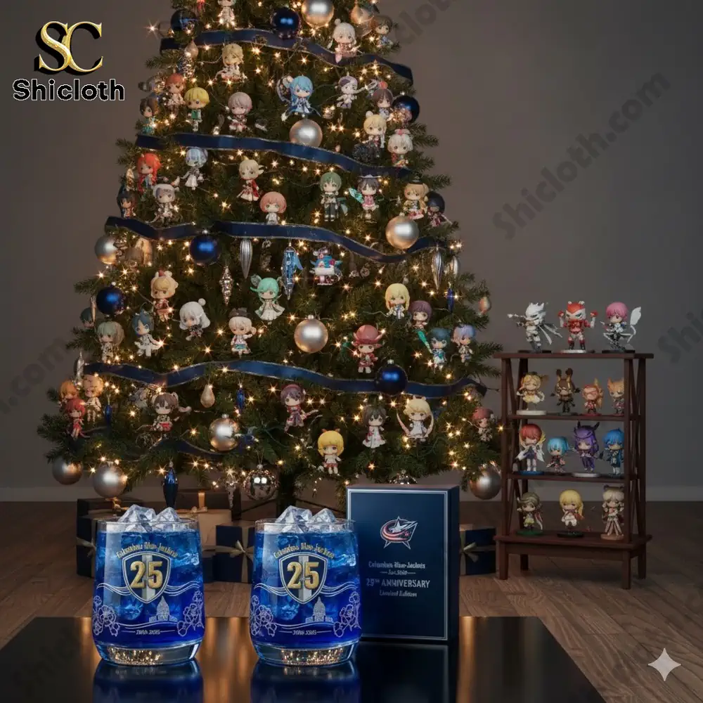 A decorated Christmas tree with many small collectible figures and a Shicloth Columbus Blue Jackets twenty five anniversary glass displayed in front.