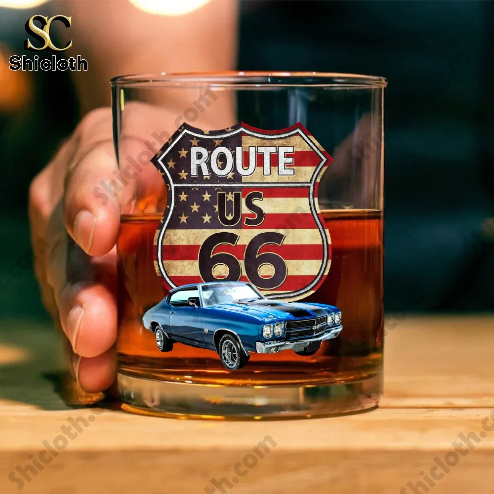 Clear glass with Route US 66 design and a red classic car held in a hand!
