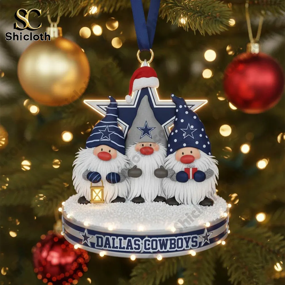 Close up of a Dallas Cowboys themed gnome ornament hanging on a Christmas tree!