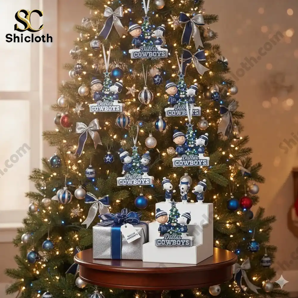 Christmas tree decorated with Dallas Cowboys themed ornaments featuring cartoon characters.