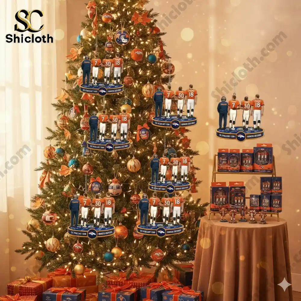 Christmas tree decorated with multiple Broncos themed ornaments featuring four figures standing together.