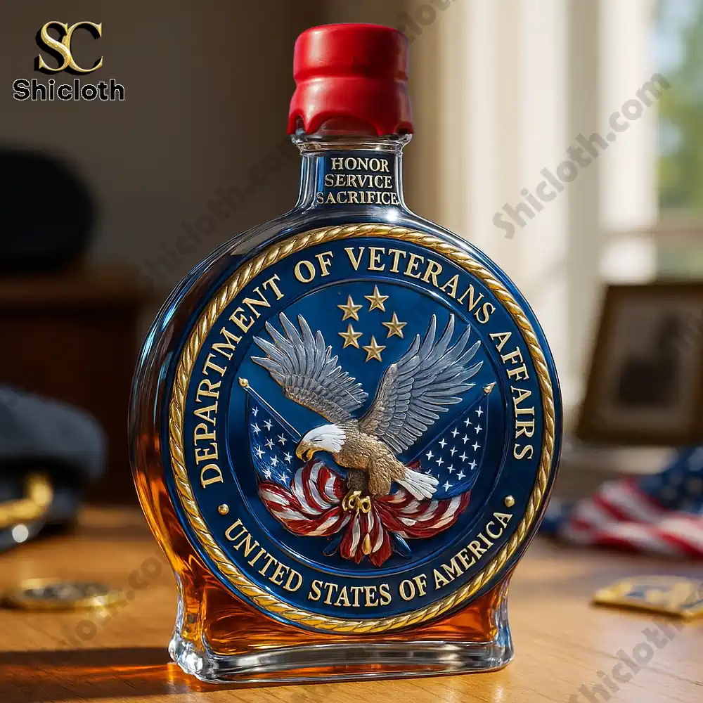 Close up of a decorative bottle featuring a veterans themed emblem on a table.
