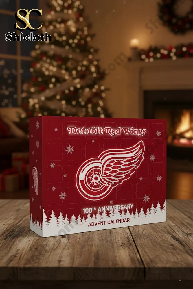 Detroit Red Wings 100th Anniversary Advent Calendar box displayed on a wooden table with a Christmas tree in the background.