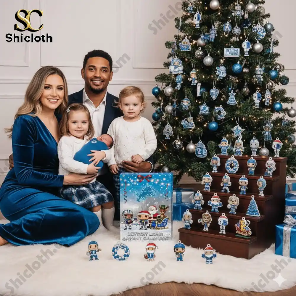 Family sitting by Christmas tree with Detroit Lions advent calendar and themed decorations!