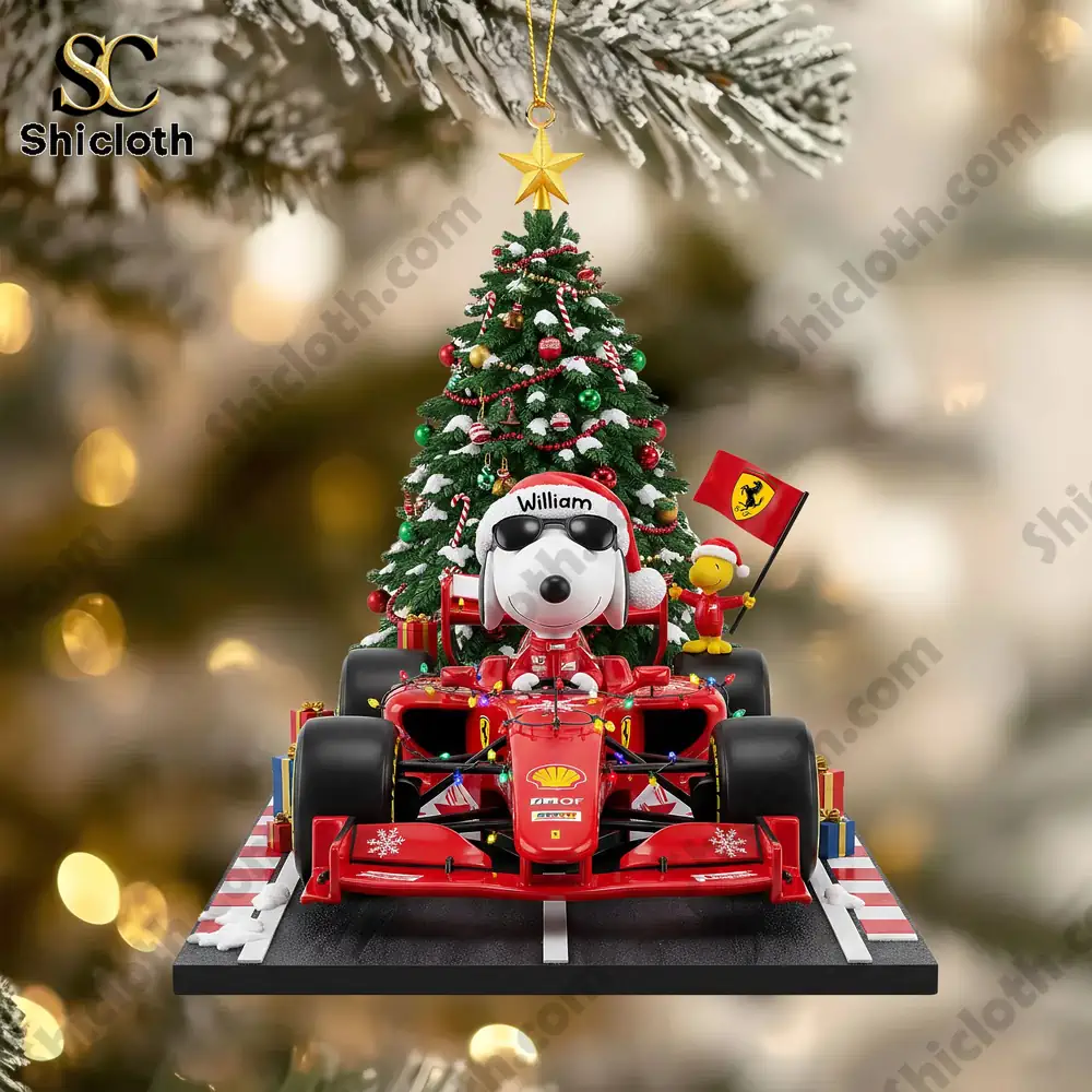 Ferrari car ornament with Snoopy holding a flag and a small Christmas tree.