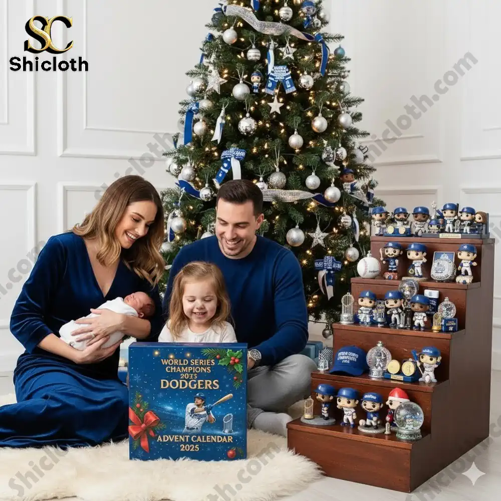 A family opens a Dodgers 2025 Advent calendar beside a Christmas tree decorated in blue and silver.