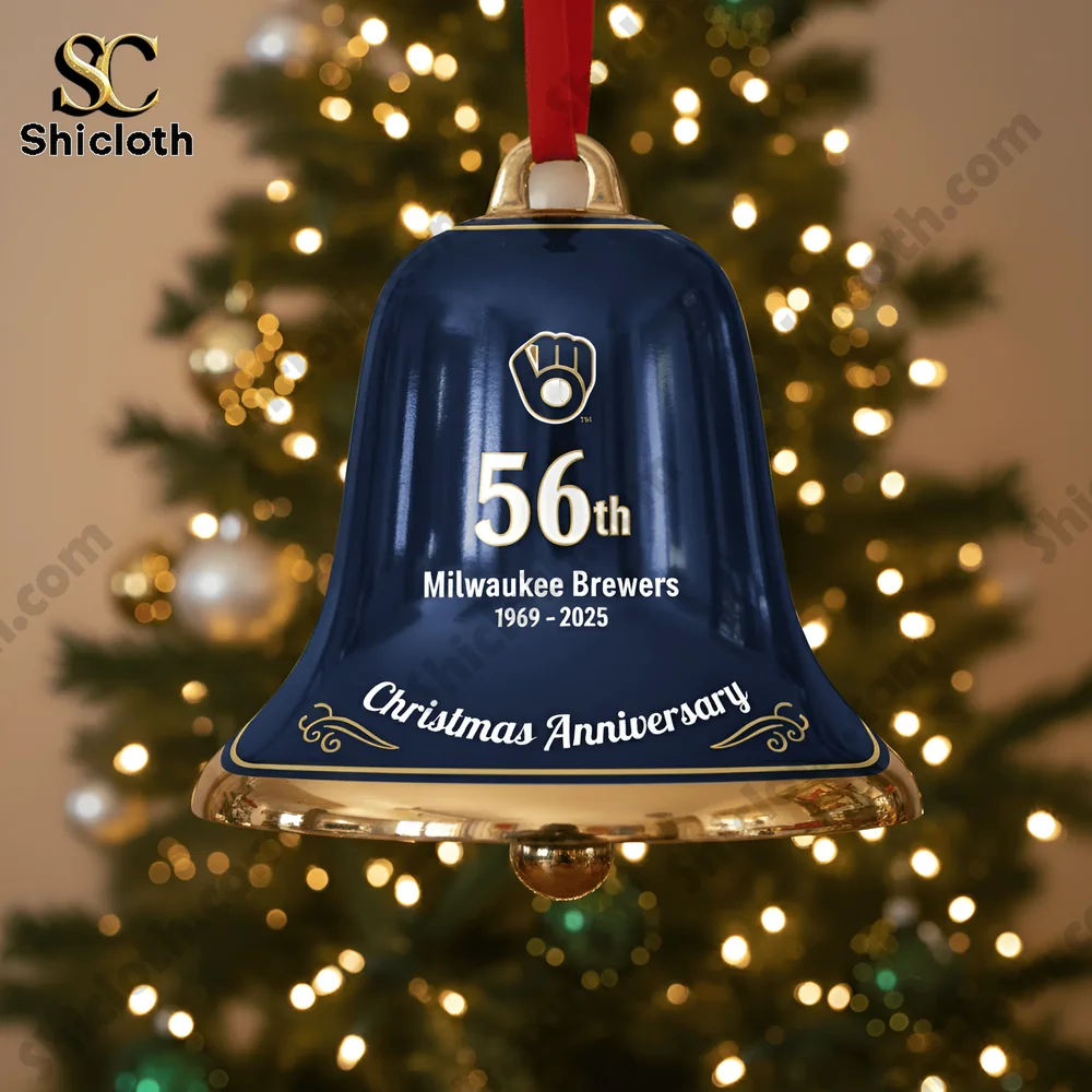Close up of a blue and gold Milwaukee Brewers 56th anniversary Christmas bell ornament hanging on a tree!