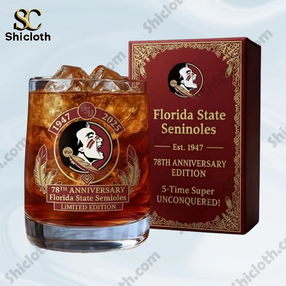 A Seminoles anniversary glass displayed beside a decorated red box.