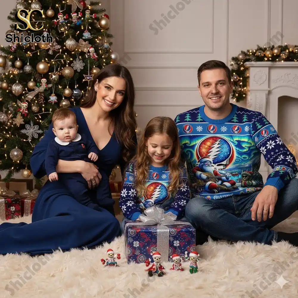 Grateful Dead Merry Christmas New Custom Ugly Sweater 5 Small family wearing Grateful Dead themed Christmas sweaters beside a Christmas tree with presents!
