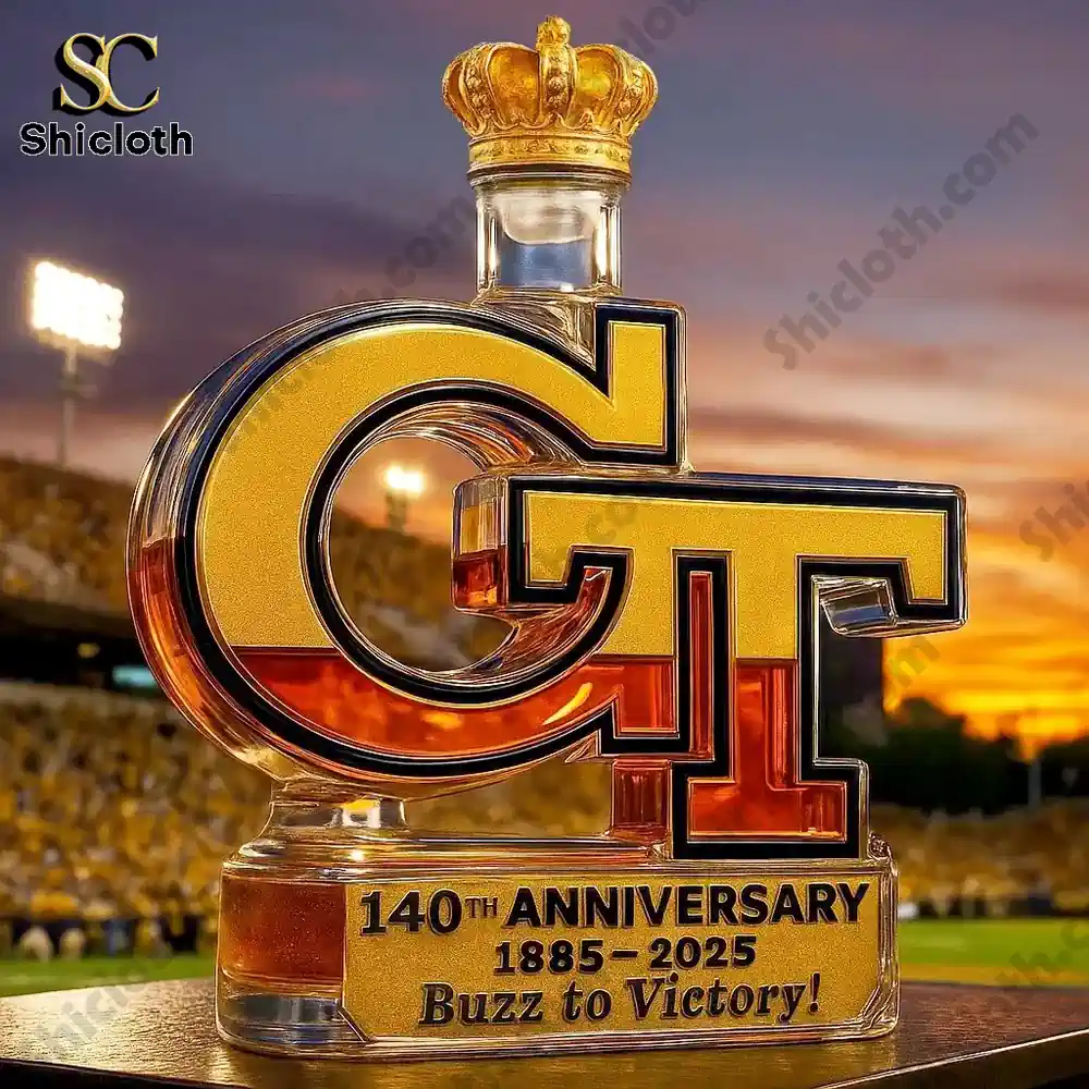 A GT anniversary bottle with a crown top displayed in a stadium setting.