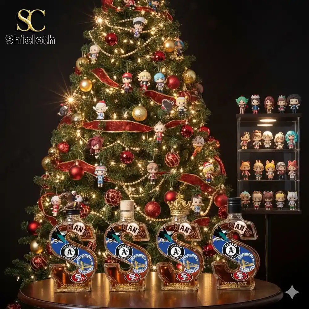 A decorated Christmas tree with many small collectible figures and several S shaped Golden Gate Grit bottles displayed in front.