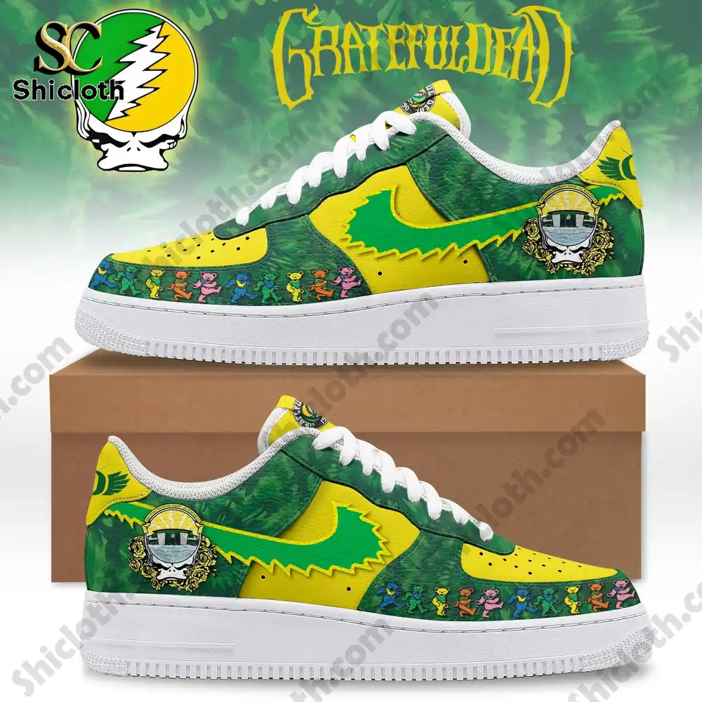 Close up view of green and yellow themed sneakers featuring decorative character graphics.