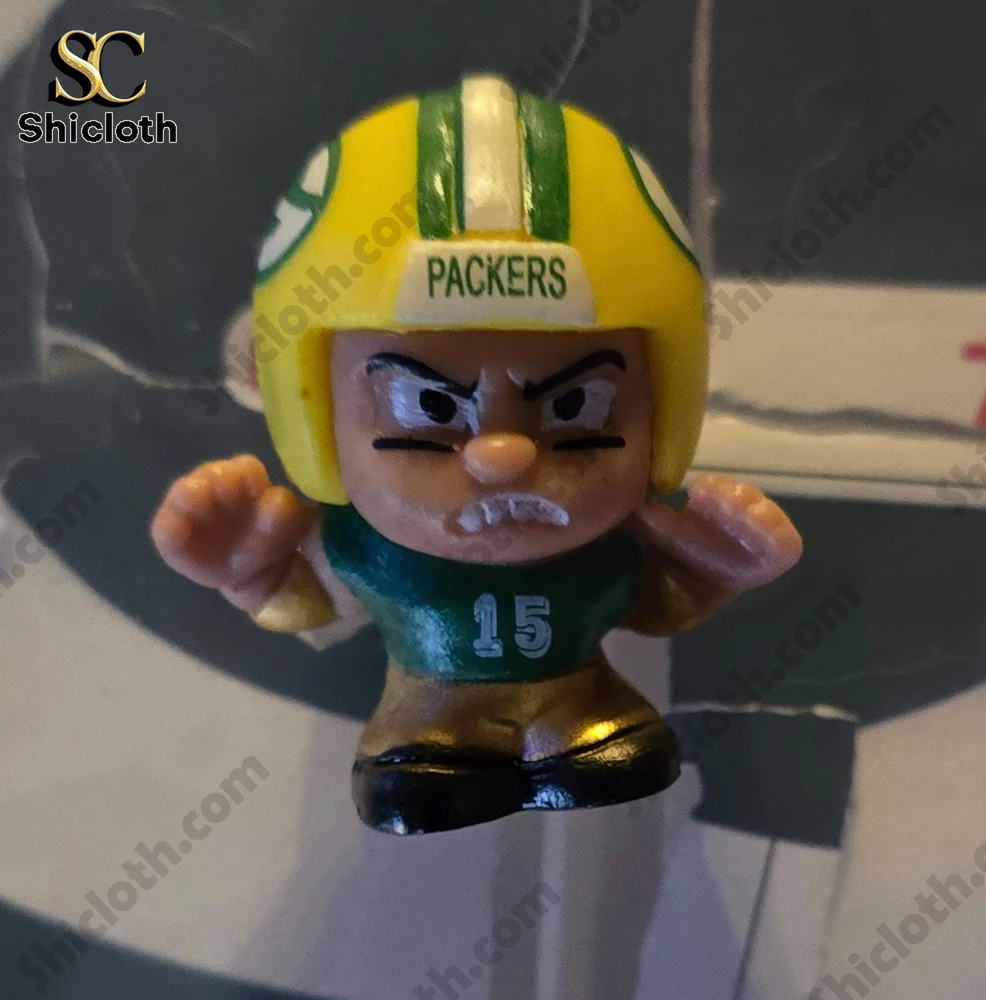 Green Bay Packers Advent Calendar 2025 NFL Countdown Gift Box 6 Close-up of a small Green Bay Packers player figure wearing a yellow helmet and number 15 jersey.