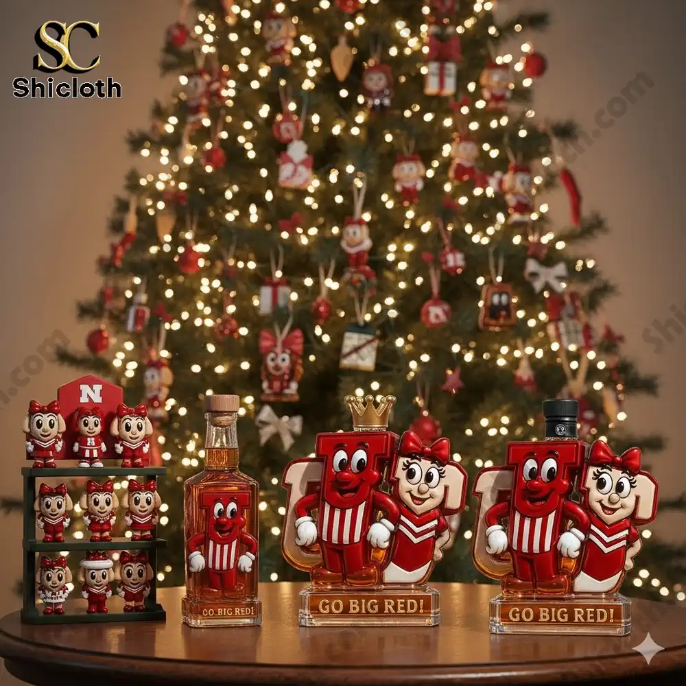Christmas display of red character bottles in front of a decorated tree!