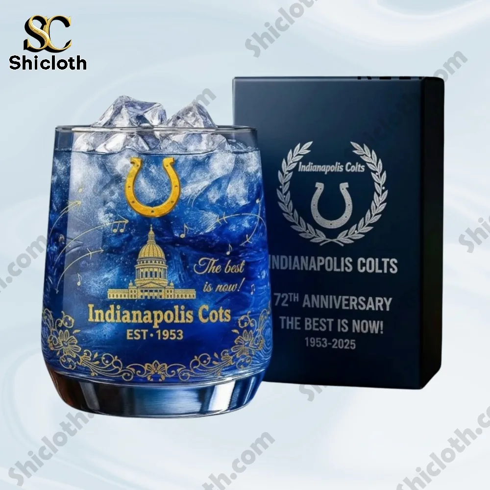 A blue Colts themed anniversary glass with ice placed beside its matching gift box.