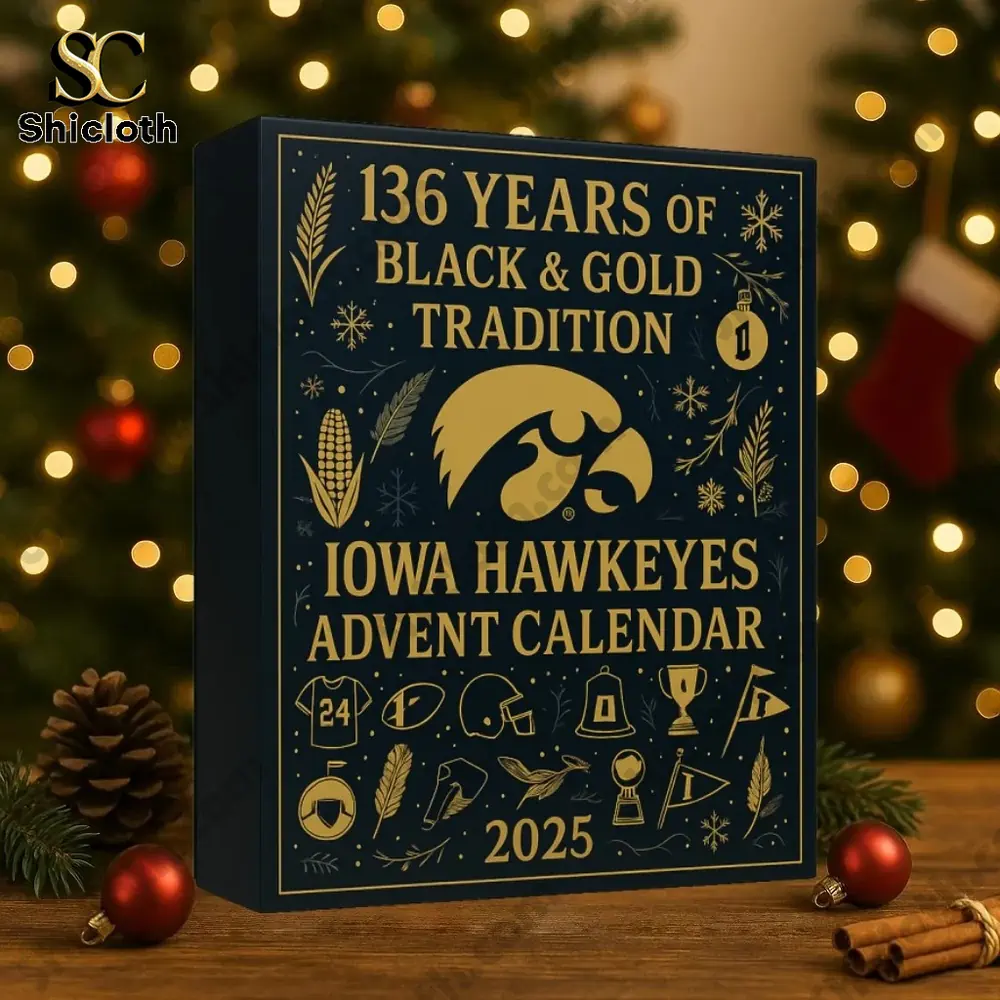 Iowa Hawkeyes Anniversary Advent Calendar 4 Iowa Hawkeyes Advent Calendar 2025 box displayed in front of a decorated Christmas tree.