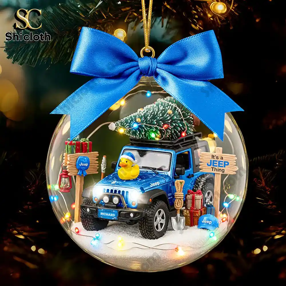 Jeep ornament with a decorated Christmas tree and holiday accessories.