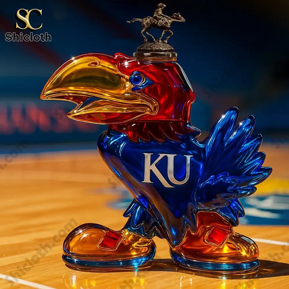 KU Jayhawk whiskey bottle with horse figurine cap, placed on a basketball court background.