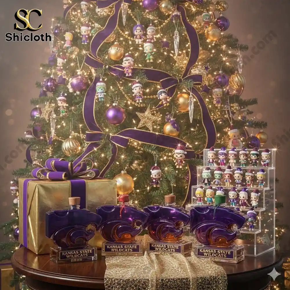 Christmas tree decorated in purple and gold with Shicloth display items and small collectible figures.