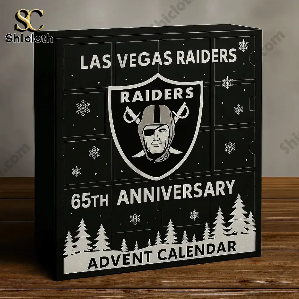 Close up of a black Las Vegas Raiders 65th Anniversary advent calendar box on a wooden table.