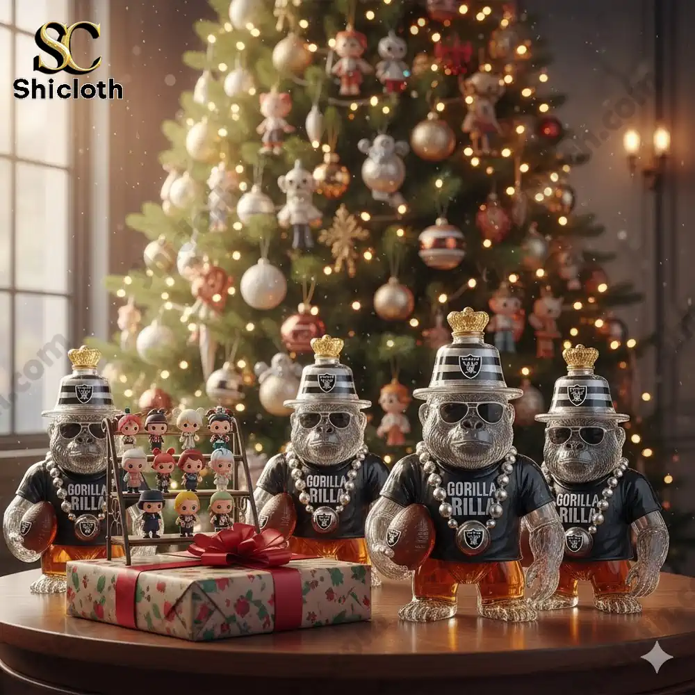 A collection of Gorilla Rilla whiskey bottles dressed in Raiders gear and displayed under a Christmas tree.