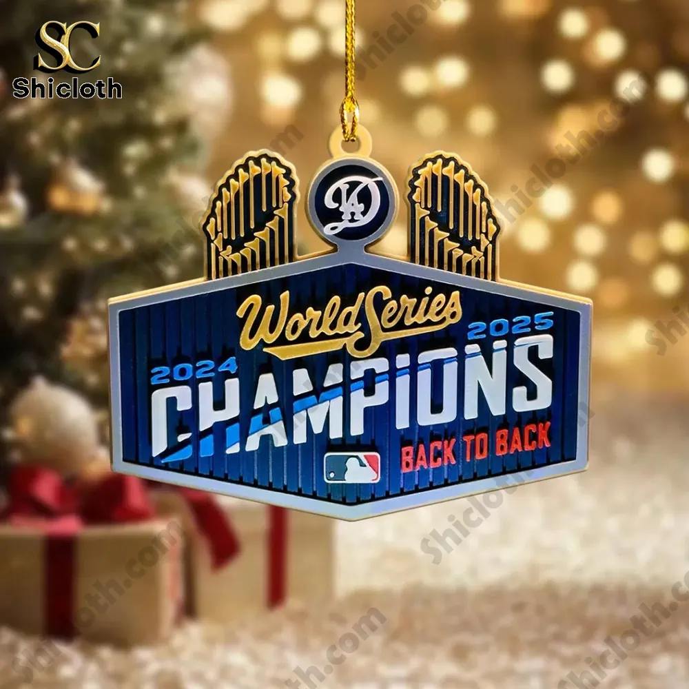 Blue ornament showing World Series champions years hanging on a holiday tree.