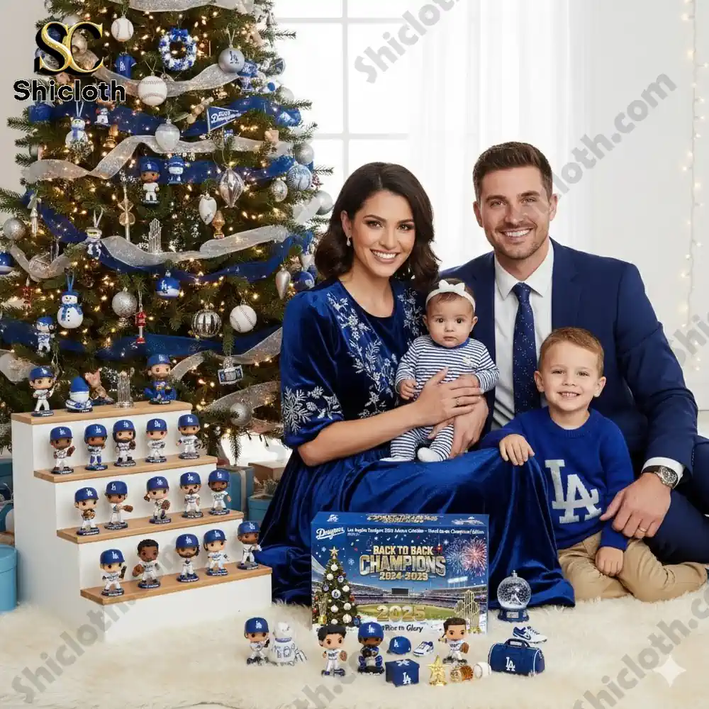 A family posing by a Christmas tree decorated with Los Angeles Dodgers ornaments and the 2025 Dodgers Advent Calendar on display.