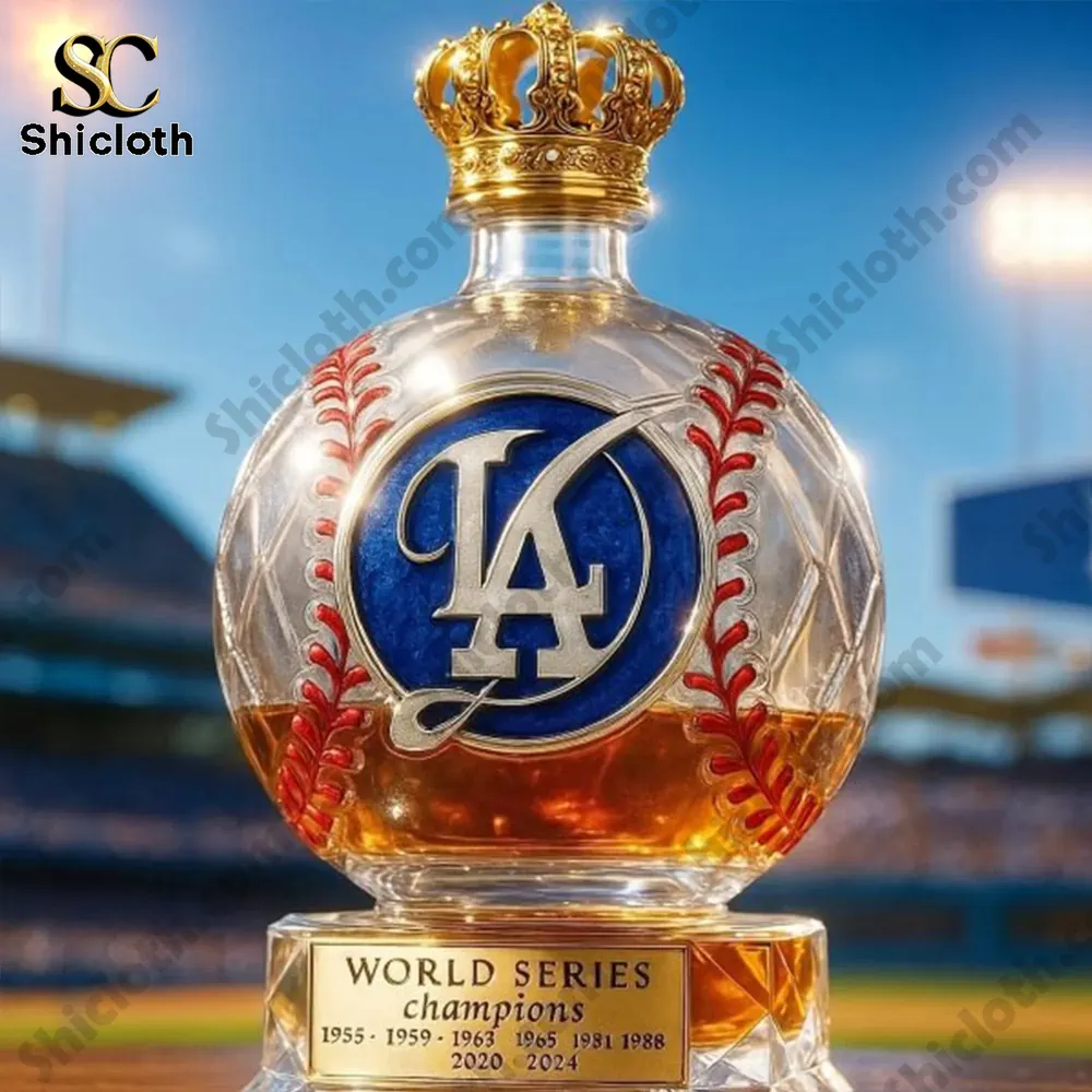 Close-up of a Los Angeles Dodgers World Series commemorative whiskey bottle, featuring the Dodgers logo and a crown on top.