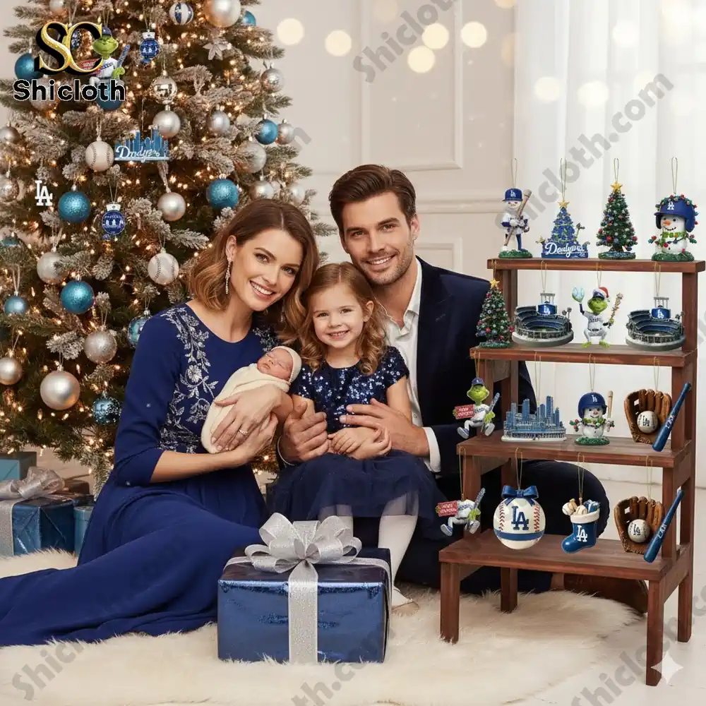 Happy family posing with Los Angeles Dodgers Christmas decorations and Shicloth gift setup.