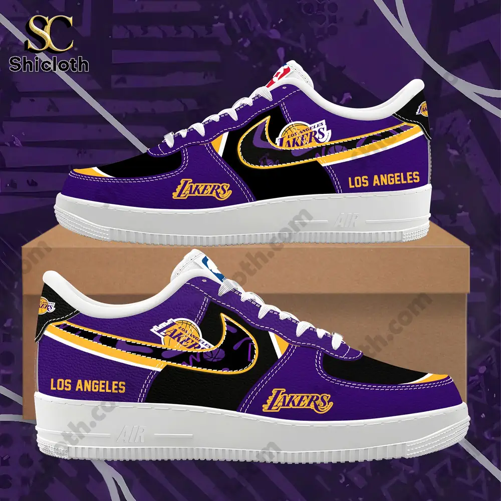 Purple and black Los Angeles Lakers themed sneakers displayed on a shoe box against a purple backdrop.