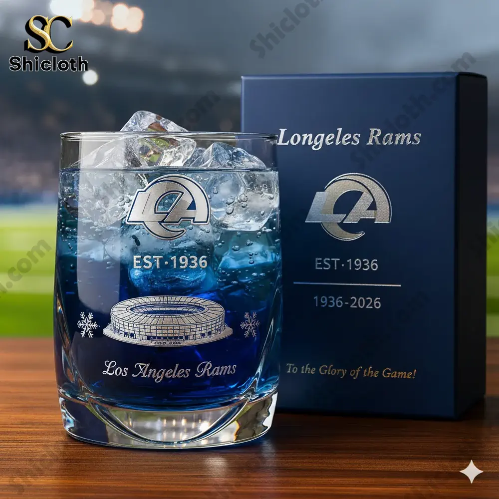 A close view of a Los Angeles Rams themed glass filled with ice positioned in front of a matching gift box!