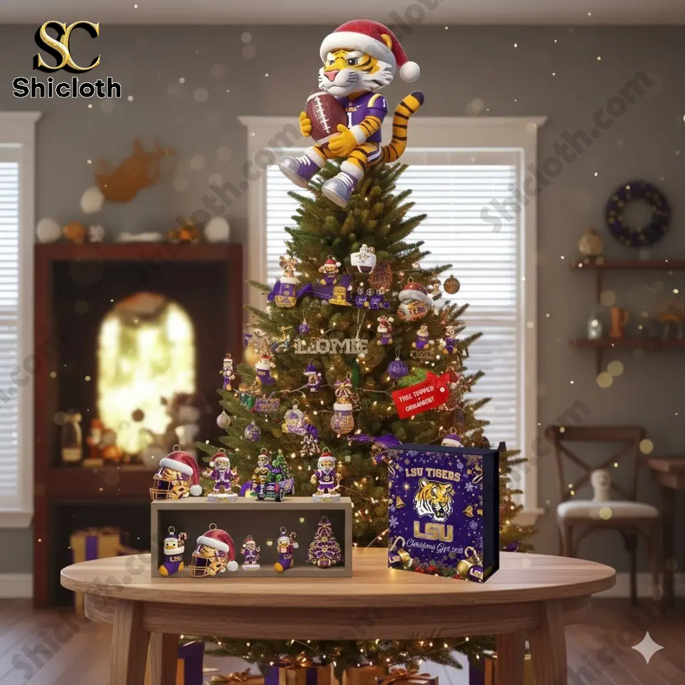 Christmas tree decorated with LSU ornaments and tiger topper in living room.