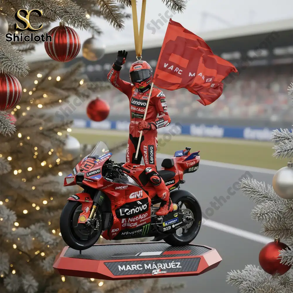Marc Marquez figurine holding a victory flag on a Ducati motorbike ornament.