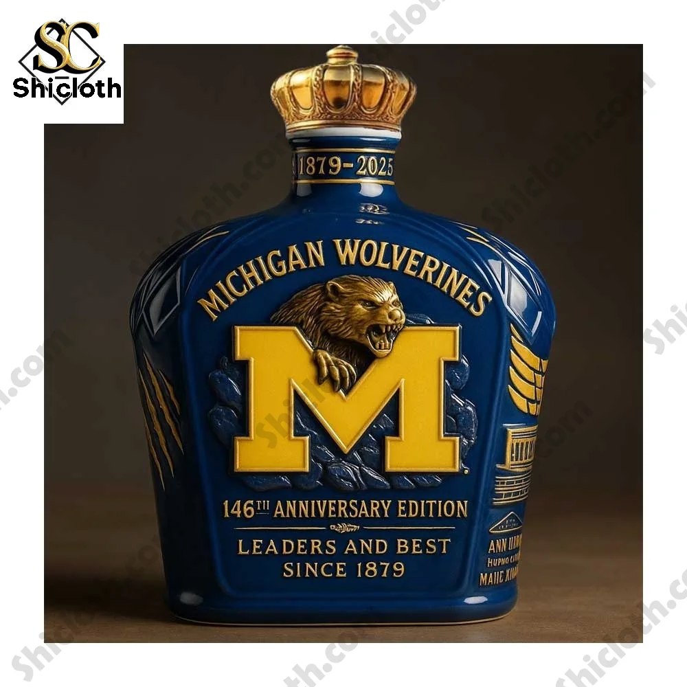 Close up of a Michigan Wolverines anniversary edition bottle with bold blue and gold design!