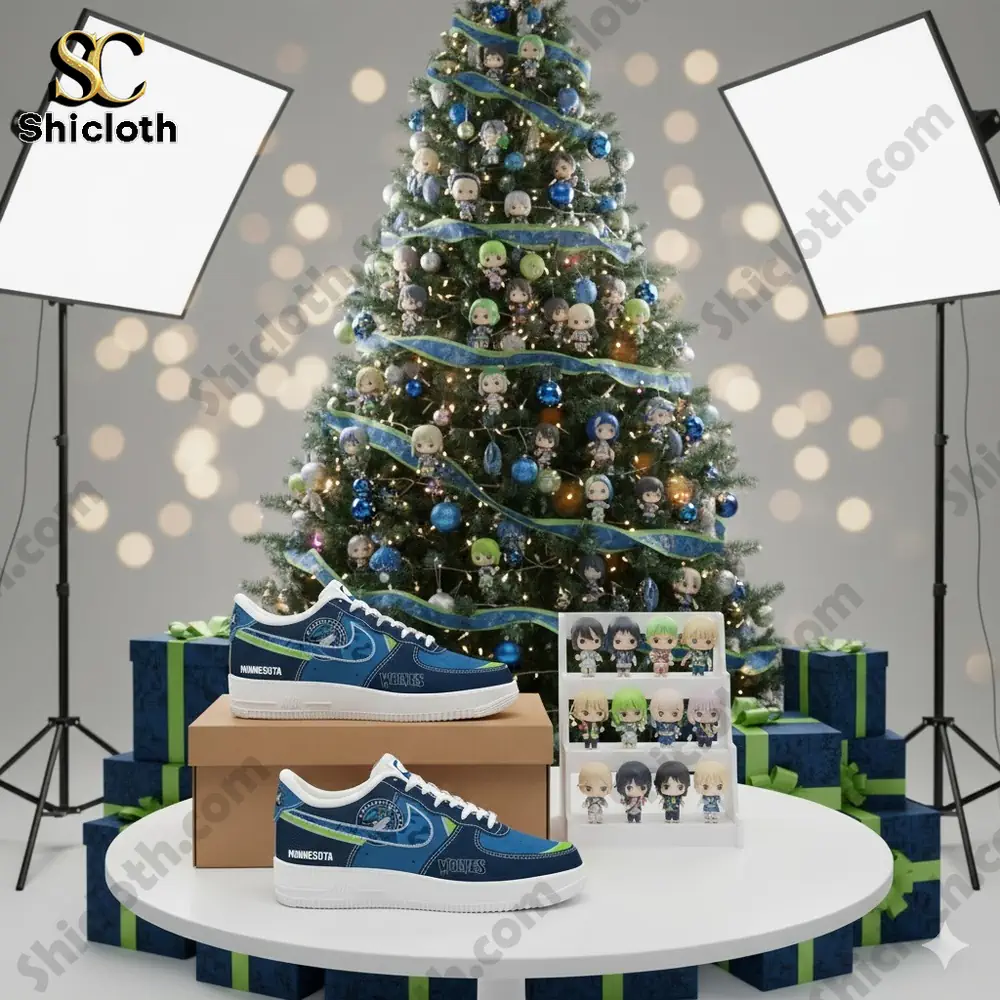 Blue Minnesota themed sneakers displayed in front of a decorated Christmas tree with small character figures and gift boxes.